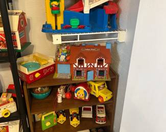 A whole closet of vintage Fisher-Price play sets 