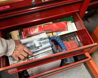 Craftsman rolling tool chests with items inside