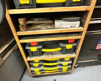 storage bins full of hardware and accessories