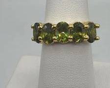 Gold Tone Ring Features Five Vibrant Oval-cut Green Gemstones | Size 7 | Total Weight 4.8 grams