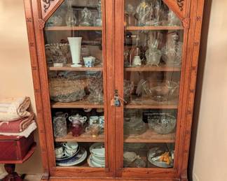 antique Victorian-style china cabinet