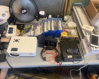 Projector, dvd player, ps4 games, phone charger/alarmclock