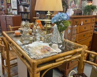 Vintage Bassett bamboo table with glass top and four chairs