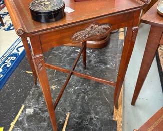 1940s mahogany side table with wheat motif on front and carving on legs. This is one of a pair.