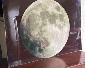 acrylic glass print featuring a detailed photograph of the full moon