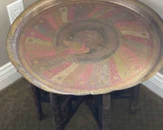 Metal top table on wood stand
