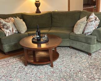 Two tier wood round coffee table, Moss Green curved corduroy sectional