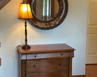 Mirrors, cabinets, many table lamps