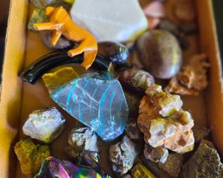 Assorted Mineral and Gemstone Collection with Carved Wooden Lion