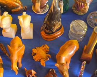 Assorted Decorative Figurines and Collectibles, including Hand-Carved Wooden Animals, Ceramic Duck Teapot, Glass Items, and Alabaster Busts