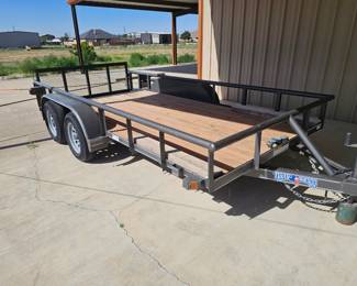 2021 Texas Bragg 16' Tandem Axle Utility Trailer Heavy-duty Texas Bragg utility trailer featuring a 16-foot treated wood deck, tandem axles, rear loading gate, and 7,000 lb GVWR. Ideal for hauling ATVs, side-by-sides, lawn equipment, building materials, furniture, and general cargo. Solid floor, good tires, and ready to work. 16' deck Tandem axle 7,000 lb GVWR Rear fold-down loading gate Wood deck 2" ball coupler Clean Texas title A versatile trailer that's equally at home on the ranch, jobsite, or around town.