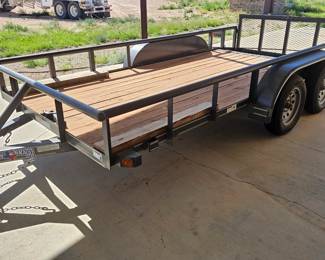 2021 Texas Bragg 16' Tandem Axle Utility Trailer Heavy-duty Texas Bragg utility trailer featuring a 16-foot treated wood deck, tandem axles, rear loading gate, and 7,000 lb GVWR. Ideal for hauling ATVs, side-by-sides, lawn equipment, building materials, furniture, and general cargo. Solid floor, good tires, and ready to work. 16' deck Tandem axle 7,000 lb GVWR Rear fold-down loading gate Wood deck 2" ball coupler Clean Texas title A versatile trailer that's equally at home on the ranch, jobsite, or around town.