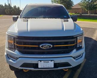 2023 Ford F-150 Tremor 4x4 Only 18,966 miles. This one-owner Tremor is powered by Ford's powerful 3.5L EcoBoost V6 paired with a 10-speed automatic transmission. Equipped with 4-wheel drive, locking rear differential, factory Tremor off-road package, tow package, bedliner, heated seats, dual-zone climate control, and SYNC touchscreen system. The Tremor package adds upgraded suspension, unique wheels, Tremor interior, distinctive hood and grille styling, and enhanced off-road capability while maintaining the comfort and practicality of a daily driver. Clean Texas title. Excellent condition inside and out. Ready for work, travel, towing, or weekend adventures. Key Features 18,966 miles 3.5L EcoBoost V6 4x4 Tremor Package Locking Rear Differential Heated Front Seats Tow Package Bedliner SYNC Touchscreen Clean Texas Title One Owner