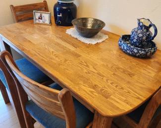 Dining Table and Four Dining Chairs.