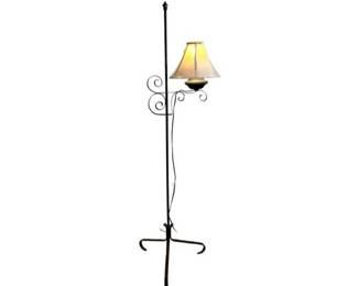 Colonial Black Wrought Iron Floor Lamp With Decorative Scrollwork And Tripod Feet