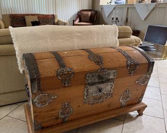 Beautiful antique trunk with gorgeous hardware extra large key trunk on a stand