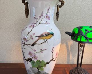 Call pair of porcelain Japanese Urns. These are breathtaking.