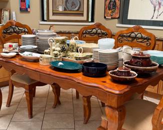 This is a beautiful French\Country, well-made table with four wood and iron chairs! And what’s on top of the table is a little more Italian inspired, really beautiful table goodies! Pack a lunch you’re going to need to to see everything in this Estate Sale!