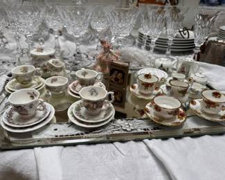 Three separate sets of miniature rare, China  tea sets these are rare and hard to find, and they are priced at half of what you can get them for on eBay