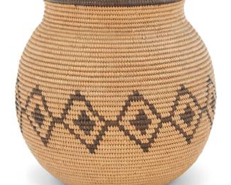 1231 A Chemehuevi basketry olla Early 20th century; Great Basin/Southwest United States The coiled globular jar with a band of conjoined concentric diamonds 5.625" H x 6" Dia. Estimate: $400 - $600