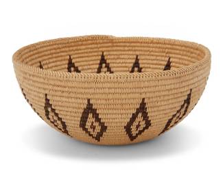 1026 A Mono Lake Paiute basketry bowl Early 20th century; Great Basin The coiled bowl with a diagonal-stitch rim above a band of floating diamonds 3.25" H x 7.5" Dia. Estimate: $500 - $700