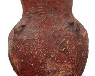 1060 An Apache basketry water vessel Late 19th/early 20th century; Southeast United States The coiled vessel with two lug handles, coated in pine pitch 10.25" H x 9" W x 8.5" D, irregular Estimate: $200 - $400