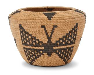 1006 A Panamint Shoshone pictorial basket Early 20th century; Great Basin The coiled vessel with angled shoulders, worked with alternating stacked triangles and moth motifs 4.125" H x 5.875" Dia. Estimate: $800 - $1,200