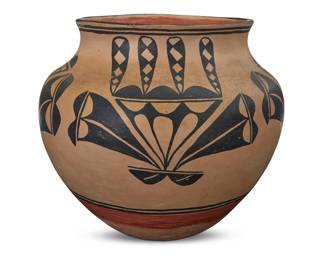 1075 A Cochiti Pueblo polychrome pottery jar Mid-20th century Unmarked Possibly Laurencita Herrera (1912-1984), with black raincloud motifs on white slip ground above a terracotta wash and puki indentation 9.25" H x 10.5" Dia. Estimate: $200 - $400