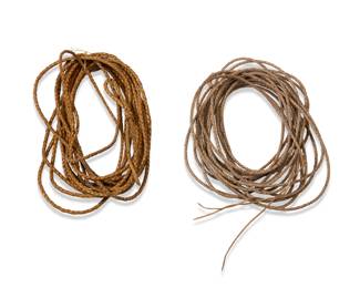 1167 Two braided rawhide riatas Late 19th/early 20th century 2 pieces Each 40'-45' L approximately Estimate: $300 - $500