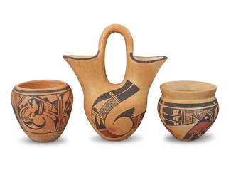 1309 Three Hopi Pueblo polychrome yellowware pottery vessels Three works:  Marcia [Ant Woman] Rickey (1918-1994, Walpi/Hopi-Tewa) A pottery wedding vase, mid/late 20th century Signed with artist's flying ant cipher to underside With brown and red swirling geometric motifs 8.375" H x 7.5" W x 4.375" D  Josephine Kachinmana (b. 20th century, Hopi-Tewa) A pottery jar, mid-20th century Signed to underside: Josephine Kachinmana With brown and red stepped and swirling geometric motifs 4.125" H x 4.5" Dia.  Theresa [Payamqa] Sahme Harvey (1904-1981, Hopi-Tewa) A pottery jar, mid/late 20th century Signed to underside: Theresa Harvey With brown and red swirling geometric and feather motifs 3.875" H x 4.5" Dia.  3 pieces Estimate: $200 - $400