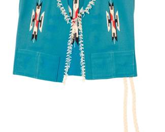 1416 A Chimayo textile vest Late 20th century; New Mexico With applied label: Ortega's / 100% All Wool / Hand Woven / Chimayo, N.M The boxy blue wool vest with multicolor serrated diamond motifs, knotted fringe accents, side splits, and a braided yarn tassel belt 23" H x 23" W Estimate: $100 - $200