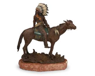 1252 Carl Kauba (1865-1922) Indian Chief on horseback Patinated and cold-painted bronze Signed in the casting: CKauba; foundry impression: AAA / WESTERN FOUNDERS; further impressed indistinctly Bronze: 12.25" H x 11.75" W x 4.75" D; Overall: 13.75" H x 11.75" W x 5.75" D Estimate: $600 - $800