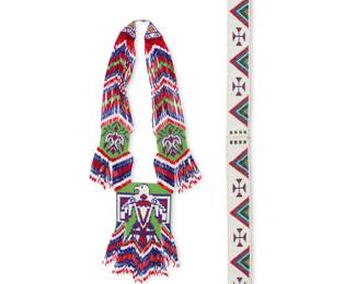 1390 Two Plains or Southwest beaded hide accessories Mid/late 20th century Comprising a beaded belt with alternating cross and concentric diamonds, and a thunderbird necklace with chevrons and fringe ends 2 pieces Belt: 29.5" L; Necklace 18.5" L, width of central element: 4.5" W Estimate: $200 - $400
