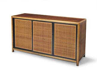1152 A Baker Furniture wood and caned sideboard Mid-20th century Two metal factory labels applied to drawer interiors The three sliding doors with caning to front, opening to reveal two central drawers and single shelf flanked by shelves to each side 32.25" H x 57" W x 19" D Estimate: $400 - $600