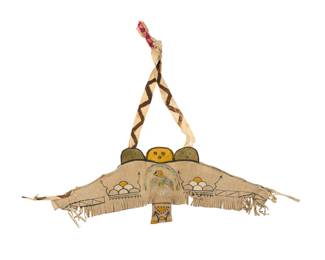 1411 A Pueblo painted hide child's dance bandolier Early 20th century Decorated with pigments, depicting an eagle and rain clouds 8" H x 27.5" W Estimate: $300 - $500