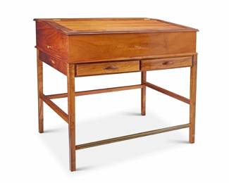 1332 A Contemporary flip top standing desk Early 21st century Unmarked The hinged top opening to reveal an open compartment above two drawers, and side pull-out surfaces, raised on squared legs joined by a box stretcher with front brass rail 46.75" H x 49" W x 37.5" D Estimate: $600 - $800