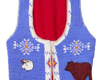 1368 A Southwest beaded hide pictorial vest Mid/late 20th century With floating geometric designs above an eagle head and bear figure to front, the back decorated with two eagles and a bison, fully lined in red fabric to interior 17.5" H x 15" W (across back at underarms) Estimate: $100 - $200