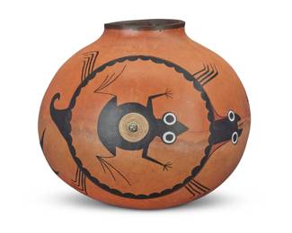 1176 Robert Rivera (20th Century) A turquoise-mounted polychrome gourd, late 20th century Signed and inscribed to underside: Robert Rivera [artist's device] / Albuq, New Mexico / (Manitou Pueblo Design) Painted with black, red, and white frogs, mounted with a spiral string centered by a turquoise accent 6.125" H x 7.25" W x 7.375" D Estimate: $200 - $300
