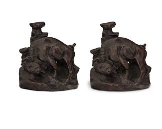 1124 Charles Marion Russell (1864-1926) "Buffalo Rubbing Rock" (pair of bookends), 1921 Patinated bronze Each signed and dated in the casting: C M Russel [cattle cipher]; each with foundry impression: Roman Bronze Works, N.Y. 2 pieces Each: 7.125" H x 7" W x 3.875" D Estimate: $3,000 - $5,000