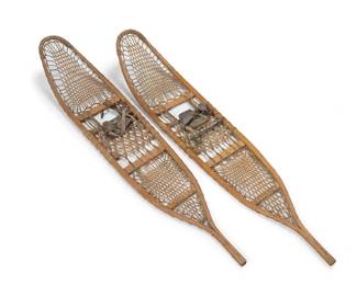 1282 A pair of American Fork and Hoe WWII military issue snowshoes 1942 Each burn marked: AF H CO WALLINGFORD VT US / 10X58 / 1942 / 0614 Each with babiche webbing and wood frame, the pair of snowshoes issued for the U.S. Army 10th Mountain Division during WWII, together with a pair of Huron-style snowshoes 4 pieces Each A & F: 56.5" L x 10.5" W x 8.5" D; Each Huron: 37.75" L x 14.5" W x 1.25" D Estimate: $300 - $500