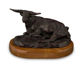 1125 Charles Marion Russell (1864-1926) "Reclining Steer," modeled 1924 Patinated bronze on marble plinth Signed in the casting: C M Russel [cattle cipher]; with foundry impression: Roman Bronze Works, N.Y. Bronze: 3.75" H x 6.625" W x 3.625" D; Plinth: 1" H x 7.125" W x 5.125" D Estimate: $2,000 - $3,000