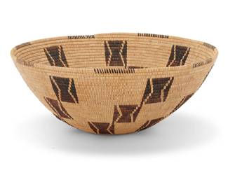 1013 A Panamint Shoshone basketry bowl Early 20th century; Great Basin The coiled bowl with partial rim ticking above bands of floating hourglasses 4" H x 10" Dia. Estimate: $1,000 - $1,500
