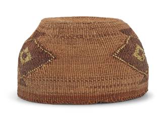 1051 A Klamath polychrome basketry hat Early 20th century; Northern California/Oregon The twined hat with diamond lozenges enhanced with imbricated quillwork 3.75" H x 6.75" Dia. Estimate: $400 - $600