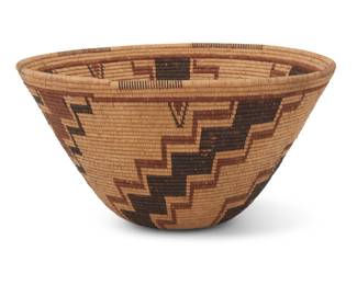 1033 A Tubatulabal polychrome basketry bowl Early 20th century; Southern Sierra, CA The coiled bowl with partial rim ticking above five radiating stepped arms issuing from center 5.25" H x 10" Dia. Estimate: $1,500 - $2,500