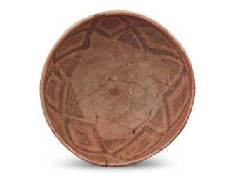 1325 An Anasazi black on red pottery bowl Circa 9th century CE-14th century CE With fine-line geometric designs 4" H x 8.75" Dia. Estimate: $200 - $400