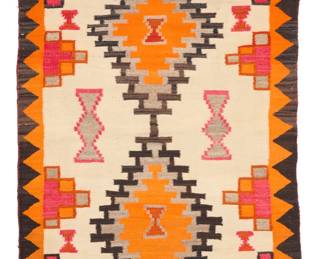 1082 A Navajo regional rug Mid-20th century, Diné Woven in orange, dark orange, red, dark brown, cream, and natural grey/brown wool, with two floating stacked diamonds and stepped long edges within a sawtooth border 56.75" H x 38.25" W Estimate: $500 - $700