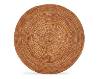 1177 A California Mission basketry tray Early/mid-20th century; Southern California With coiled construction 1.5" H x 15" Dia. Estimate: $300 - $500