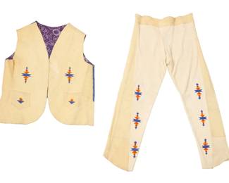 1370 A Plateau style beaded hide vest and pants set Mid-20th century Each decorated with blue and orange beadwork panels of floating serrated elements, comprising a vest with printed blue sateen fabric back and printed purple cotton back lining, and a pair of conforming beaded hide pants 2 pieces Vest: 22" H (from shoulder) x 18.5" W (across back at underarms); Pants: 33.5" H x 15.5" W at front; inseam: 25" Estimate: $200 - $400