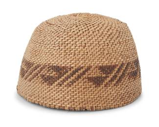 1046 A Paiute basketry child's hat Early 20th century; Great Basin The twined hat with geometric band 3.25" H x 5.5" Dia. Estimate: $300 - $500