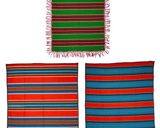 1420 Three Pendleton wool blankets Late 20th century Each with factory tag indicating fiber content In Mexican serape styles with banded designs, one with fringe 3 pieces Two larger: 77" H x 64.5" W; Smaller: 71.5" H x 62.5" W Estimate: $200 - $400